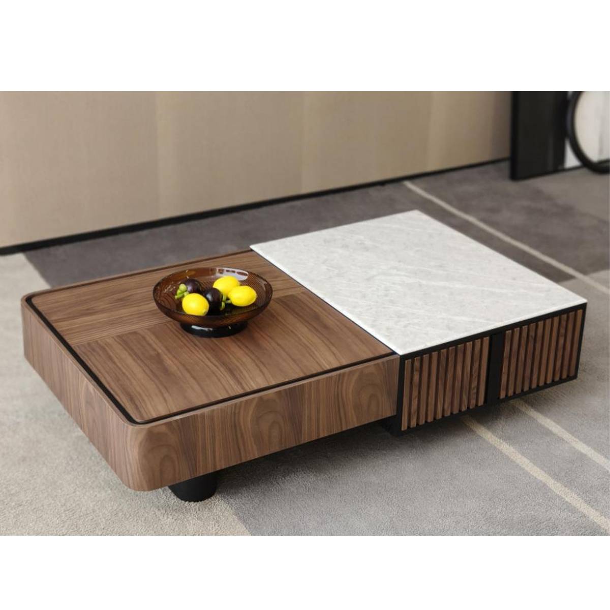 Lifestyle shot of the coffee table in a living room setting with a fruit bowl on the wood section