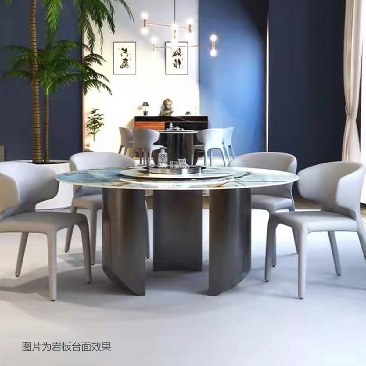 The dining table set in a modern dining room with grey chairs and a blue wall background
