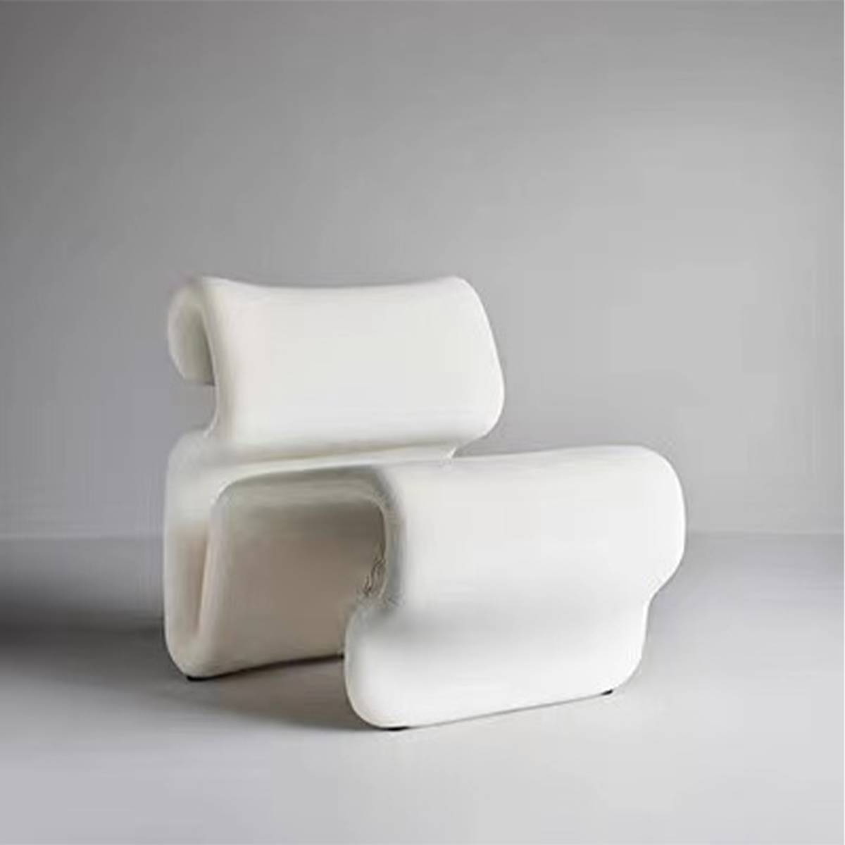 White modern curved lounge chair