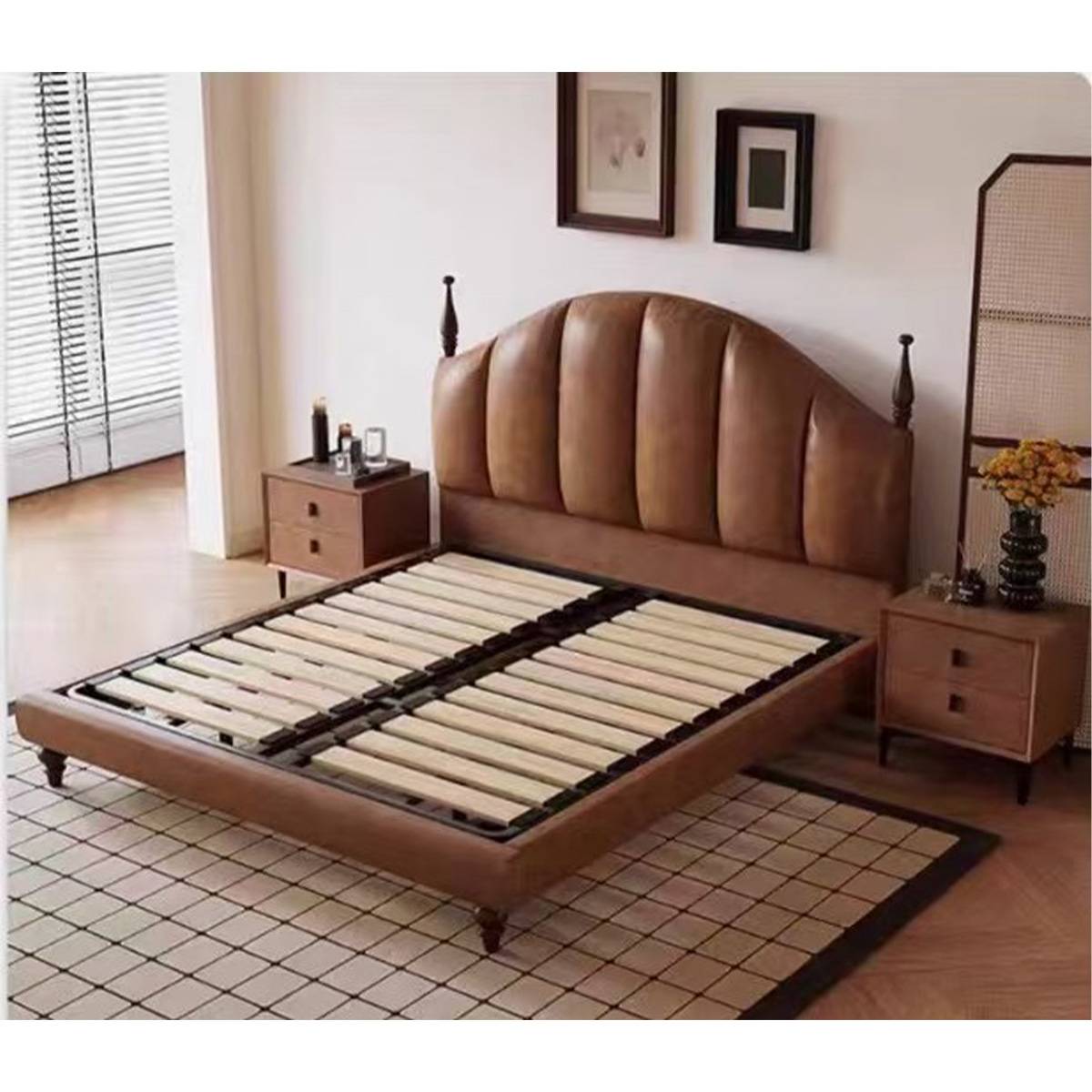Bed frame without mattress showing the wooden slat base and headboard detail