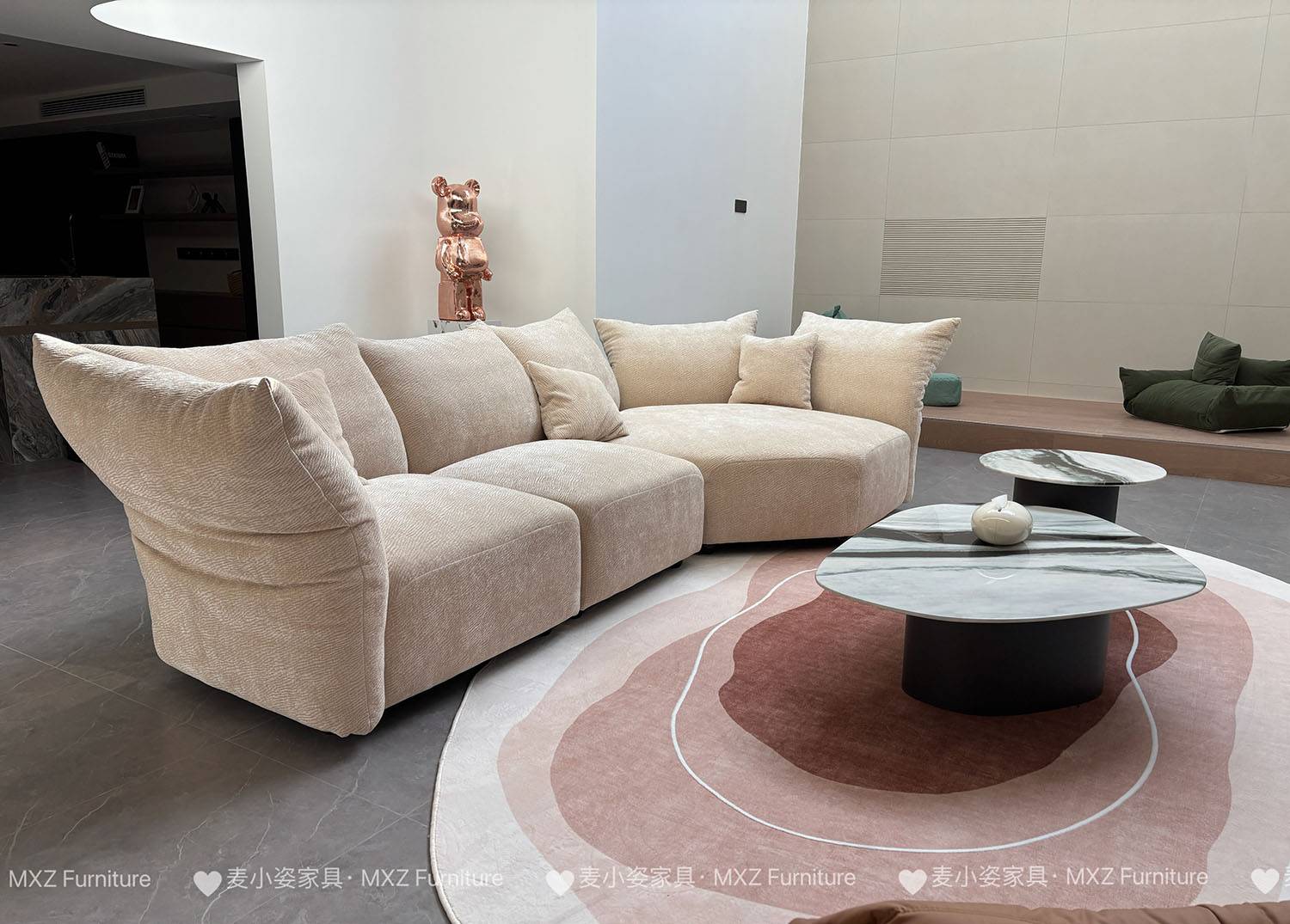 Beige curved modular sofa in a modern living room