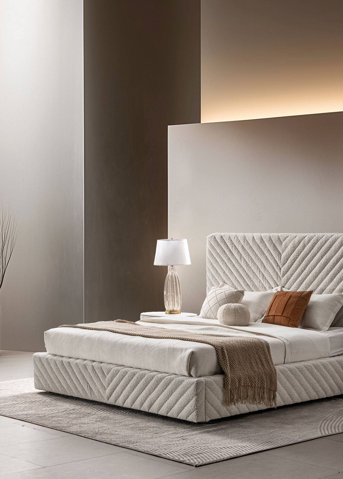 Close-up of the headboard texture and pillows.