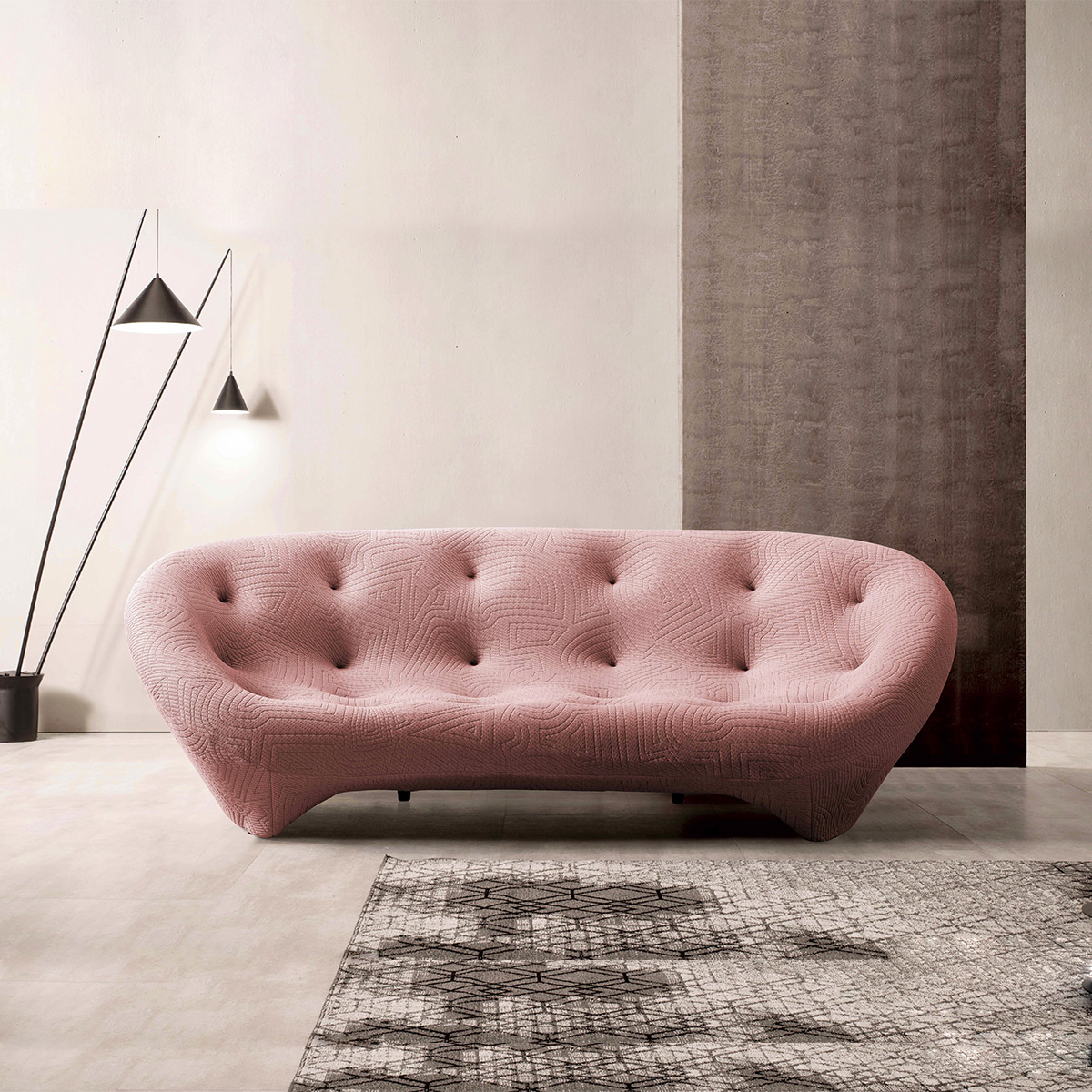 Pink shell sofa in living room setting