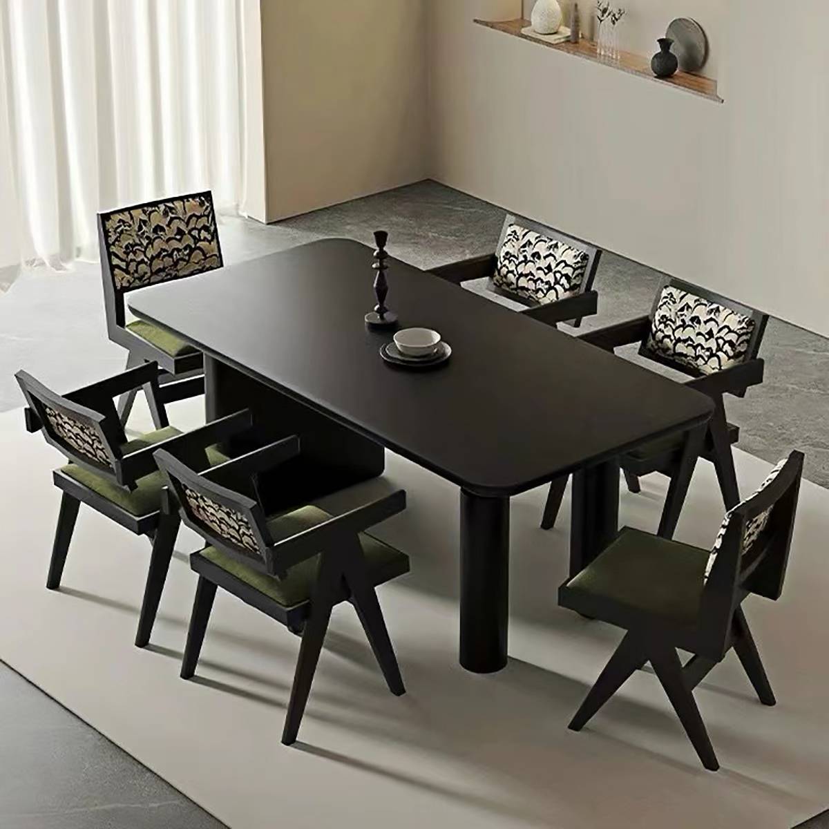 Dining room setup with six chairs and a rectangular black table