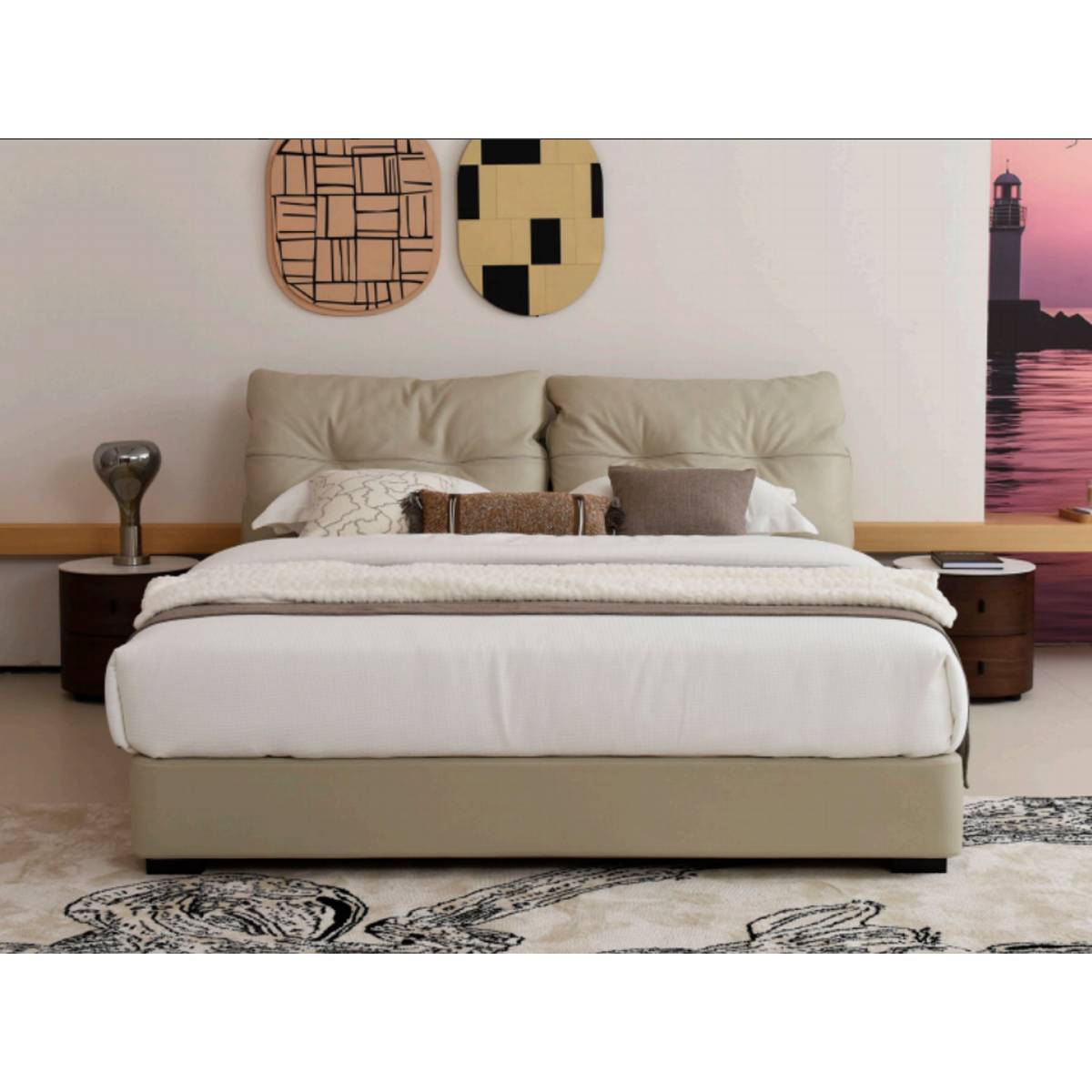 Front view of the B22 leather bed with white bedding and decorative pillows