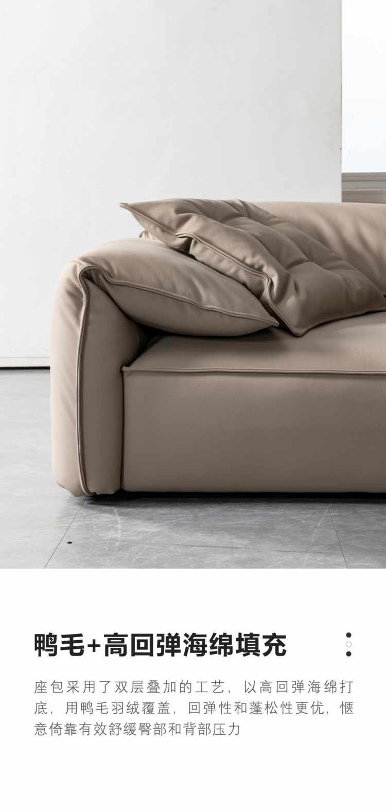 Side view of the sofa armrest showing the plush design and fabric texture.