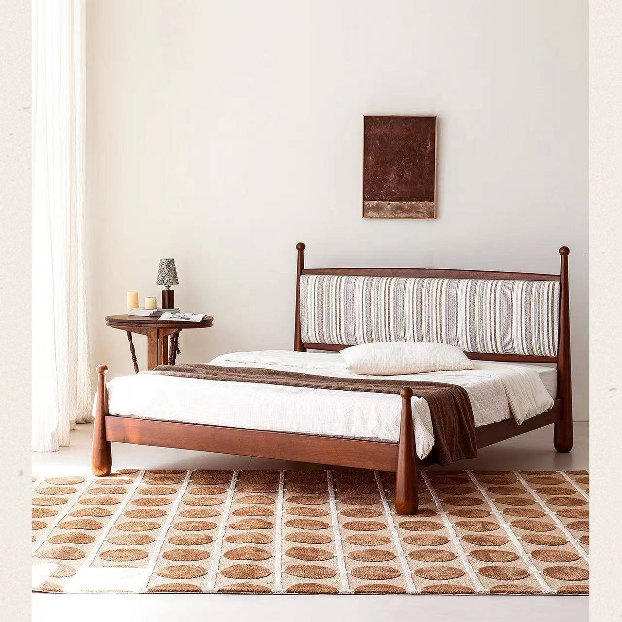 Close-up of the bed headboard and bedside table