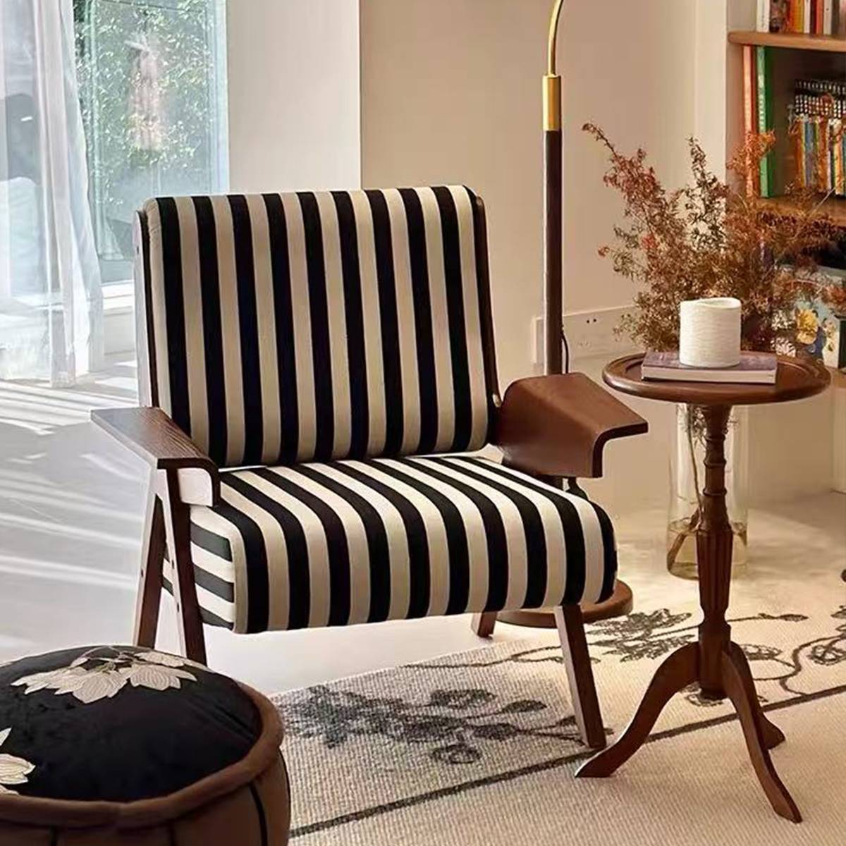Lounge chair next to a small wooden side table