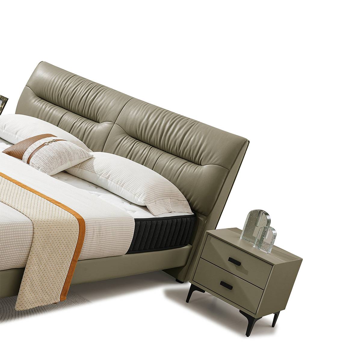 Front view of the B04 leather bed with mattress and pillows