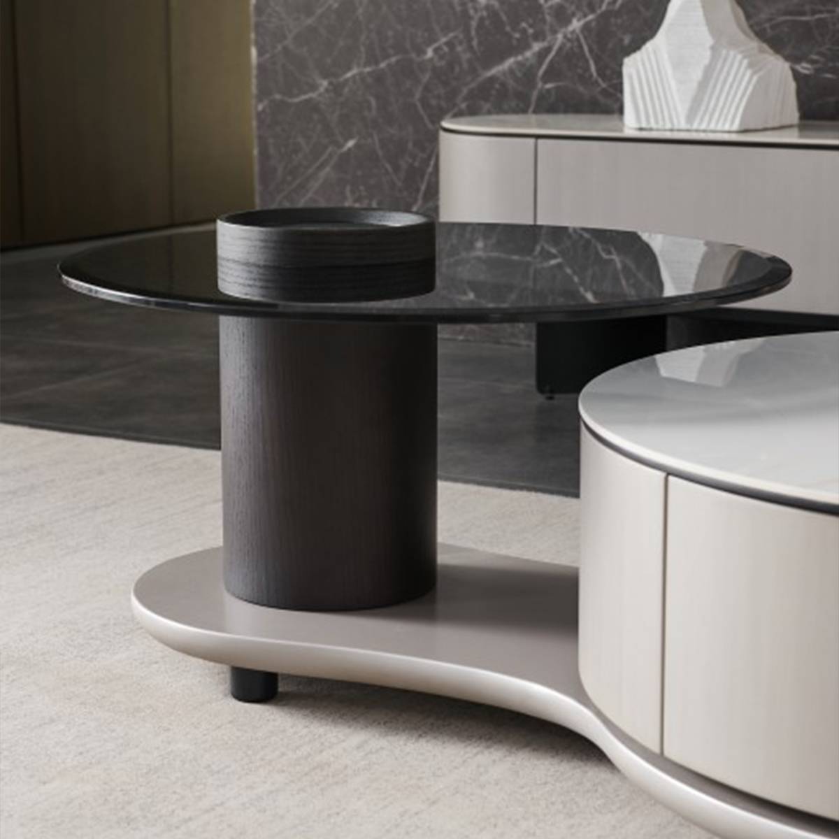 Side view showing the black glass top and cylindrical support