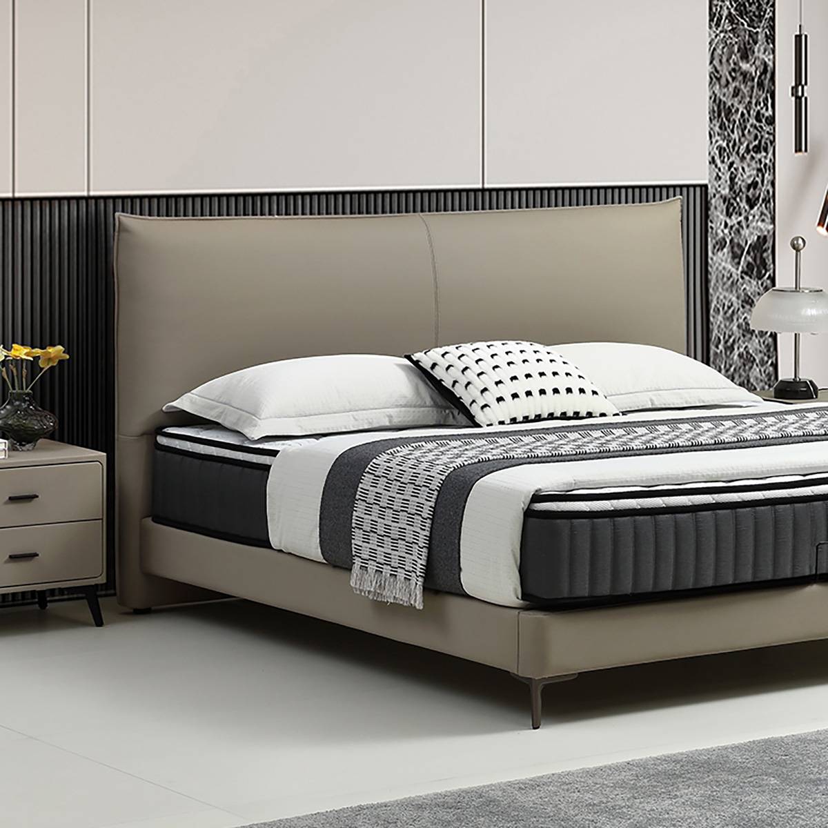 Side angle view of the bed showing the headboard and mattress