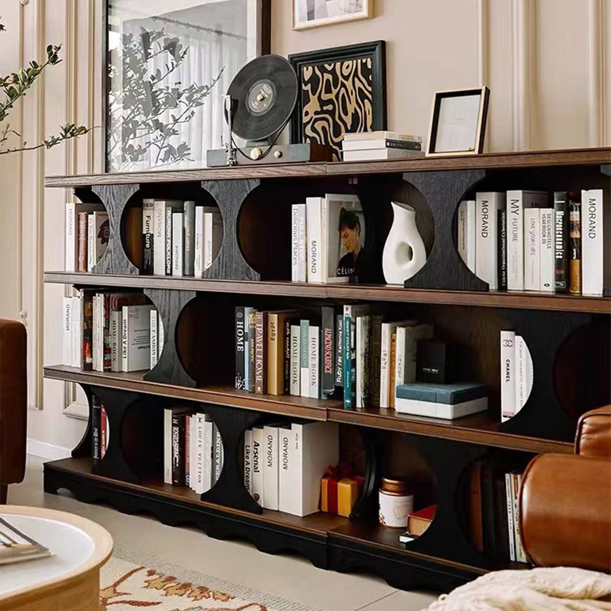 Side angle view of the bookcase showing the geometric structure