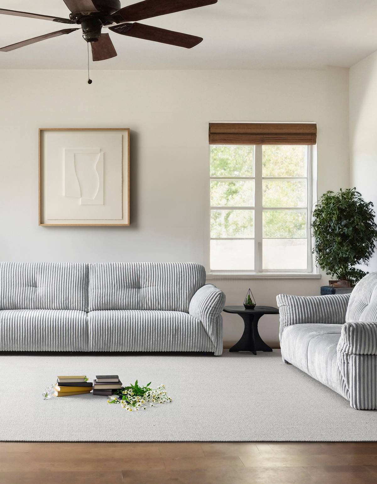 Living room setting with grey ribbed sofa and matching armchair