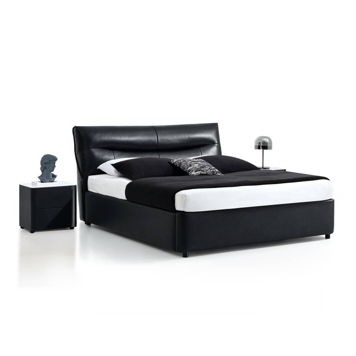 Side angle view of the black leather bed highlighting the frame and headboard design.