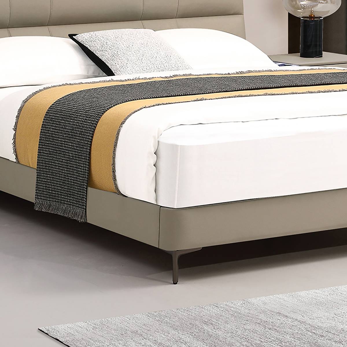Close-up of the bed frame base and metal legs