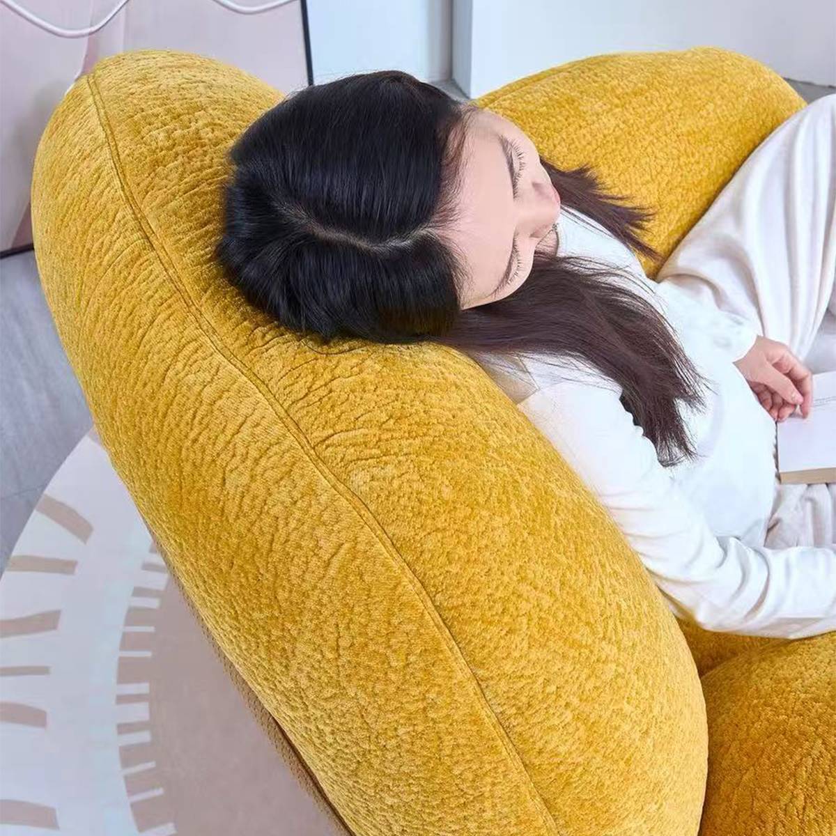 Close up of woman resting head on chair backrest