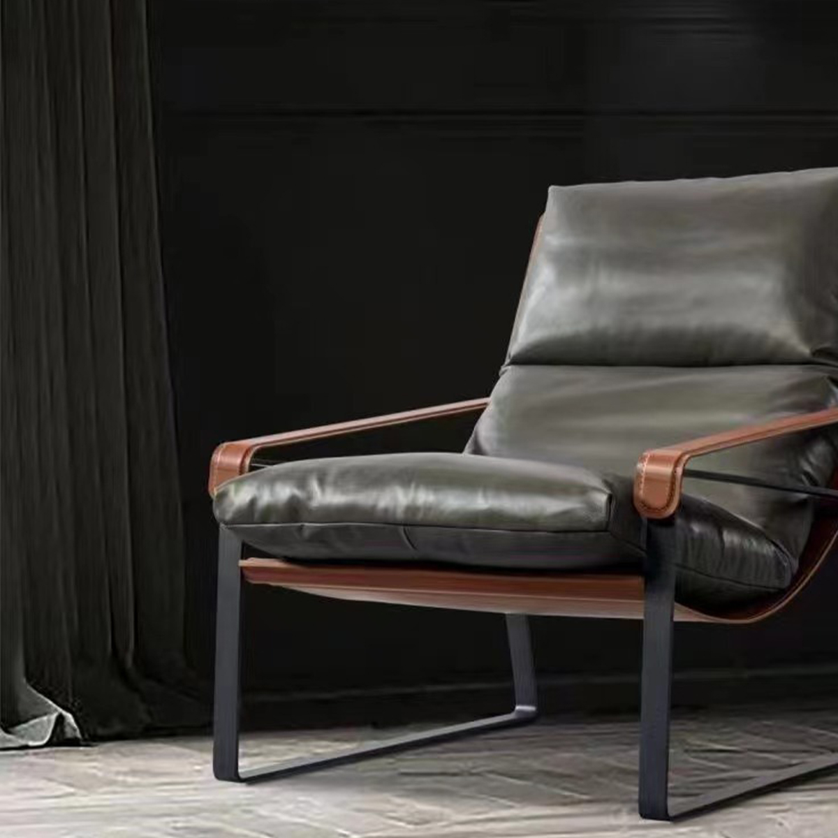 Lifestyle shot of the lounge chair in a dark interior setting