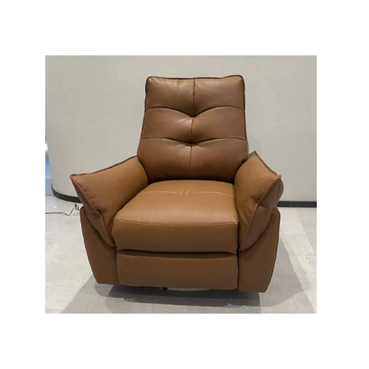 Front view of brown leather recliner chair