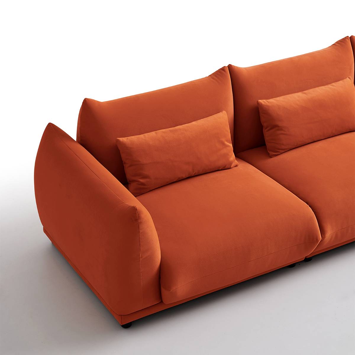 Close-up detail of the sofa armrest and seat cushion texture