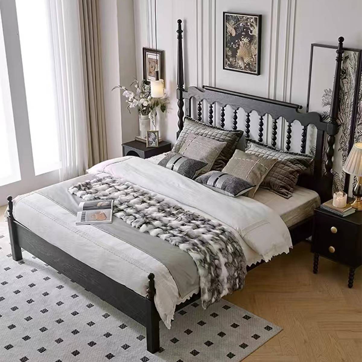 Bed styled in a bedroom setting with white bedding and a fur throw
