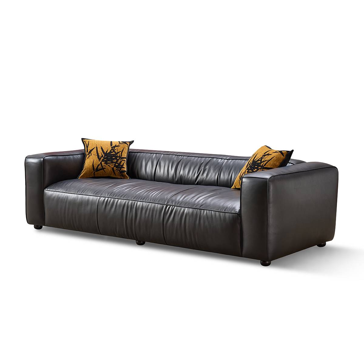 Side profile view of the leather sofa showing the armrest and back cushions