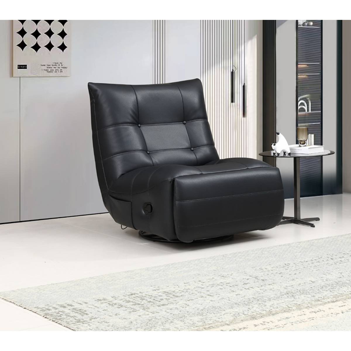 Side view of the black leather recliner chair showing the swivel base and side profile