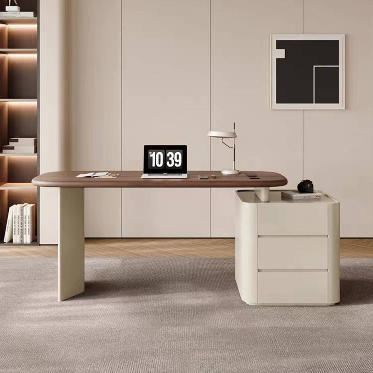 Front view of the desk showing the laptop and desk lamp setup