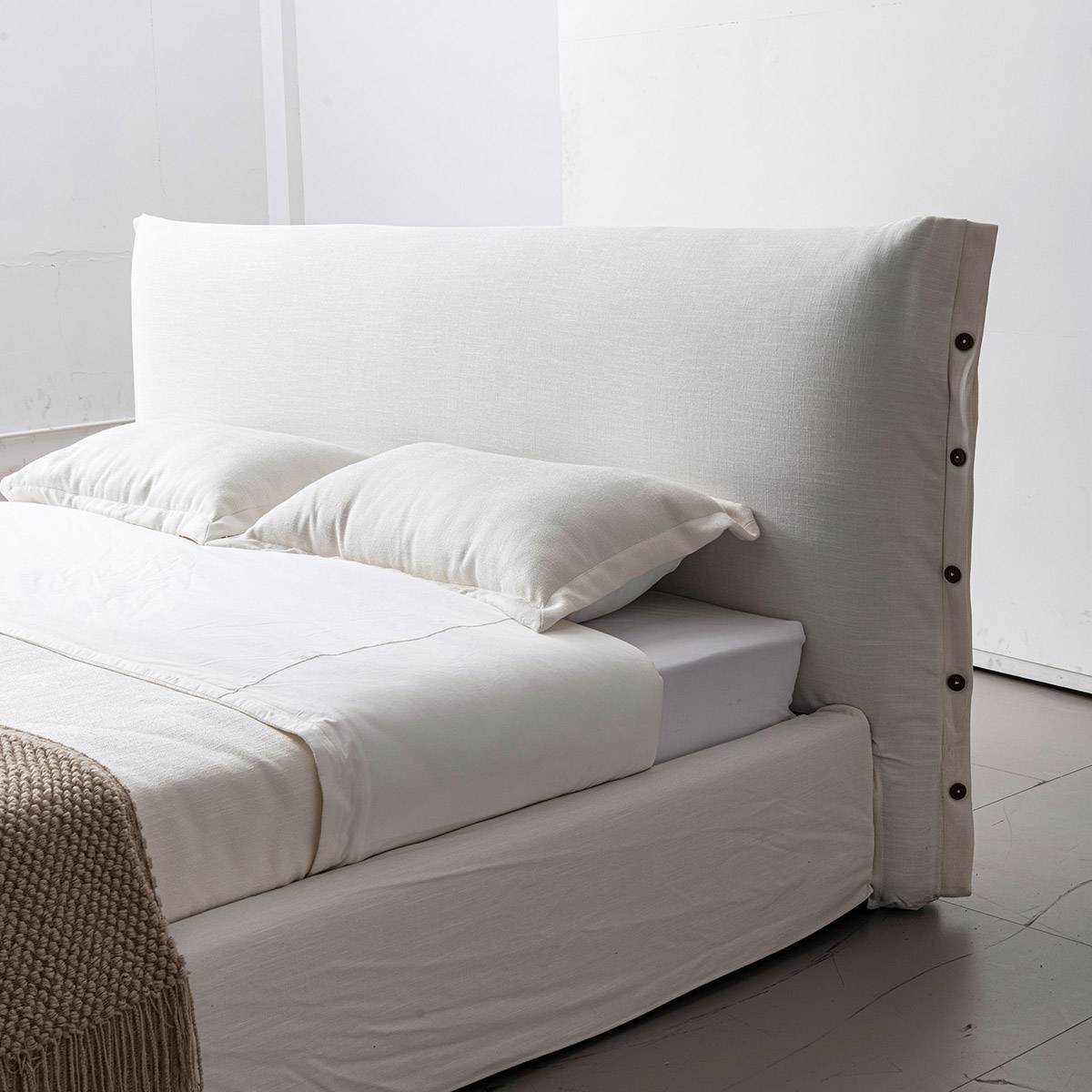 Close-up detail of the headboard and pillows