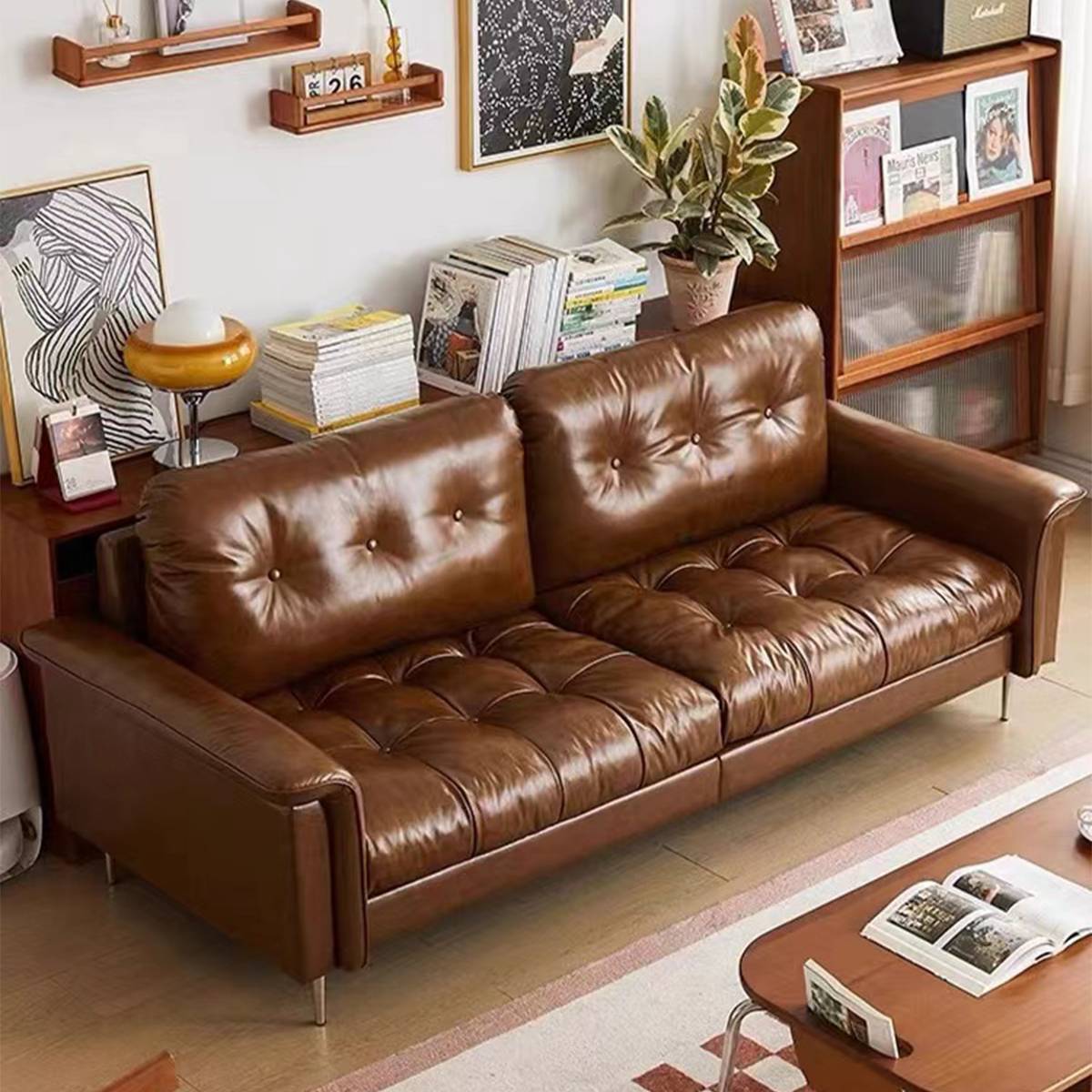 Side angle view of the sofa showing the tufted back cushions