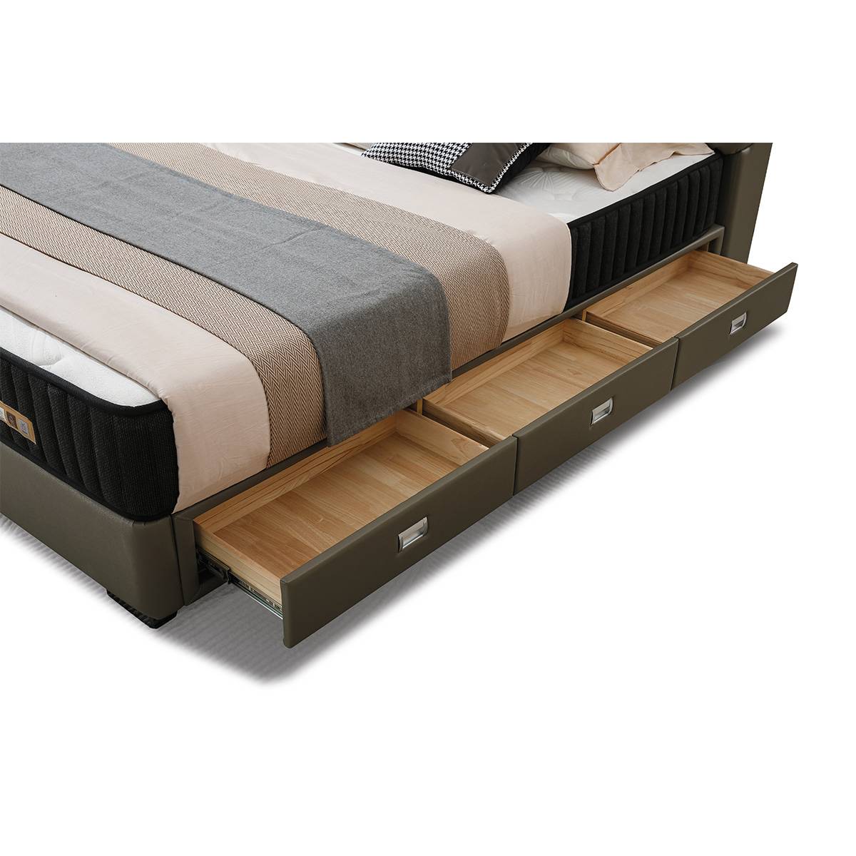 Close-up of the three under-bed storage drawers pulled out