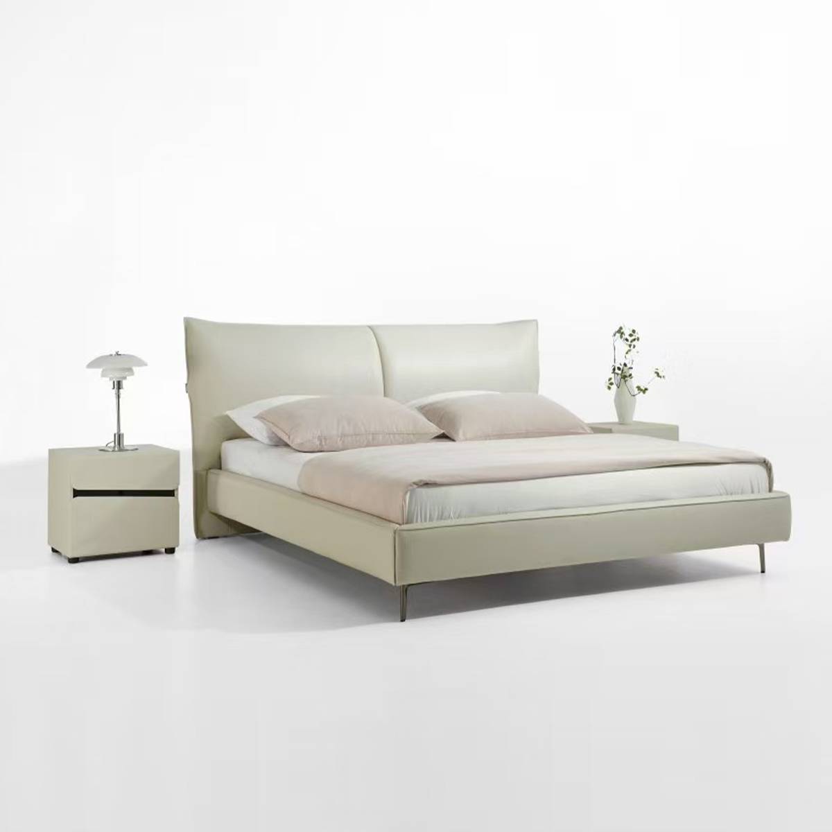 Side angle view of the modern soft bed showing the headboard and metal legs
