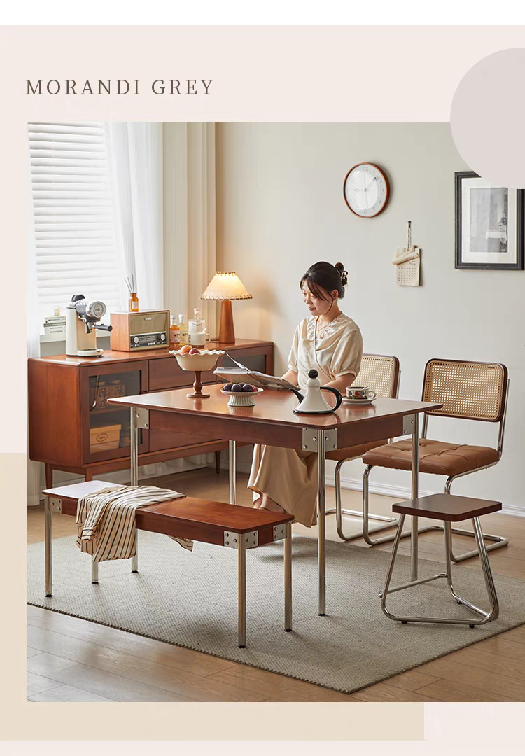 Lifestyle shot of woman reading at the dining table