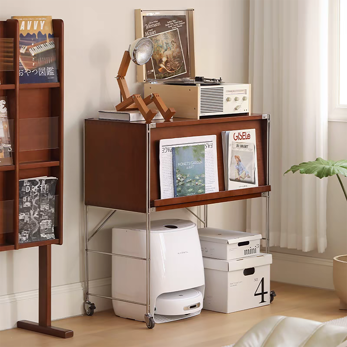 Side view of the cabinet showing magazine storage and metal frame details