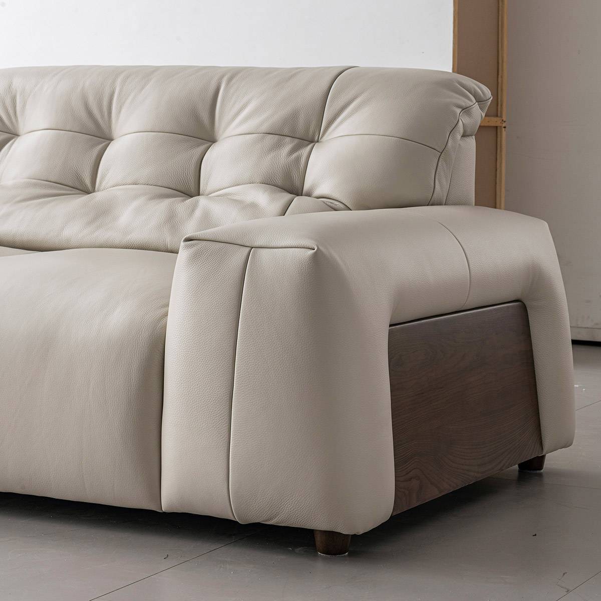 Side view showing the armrest and wooden base detail