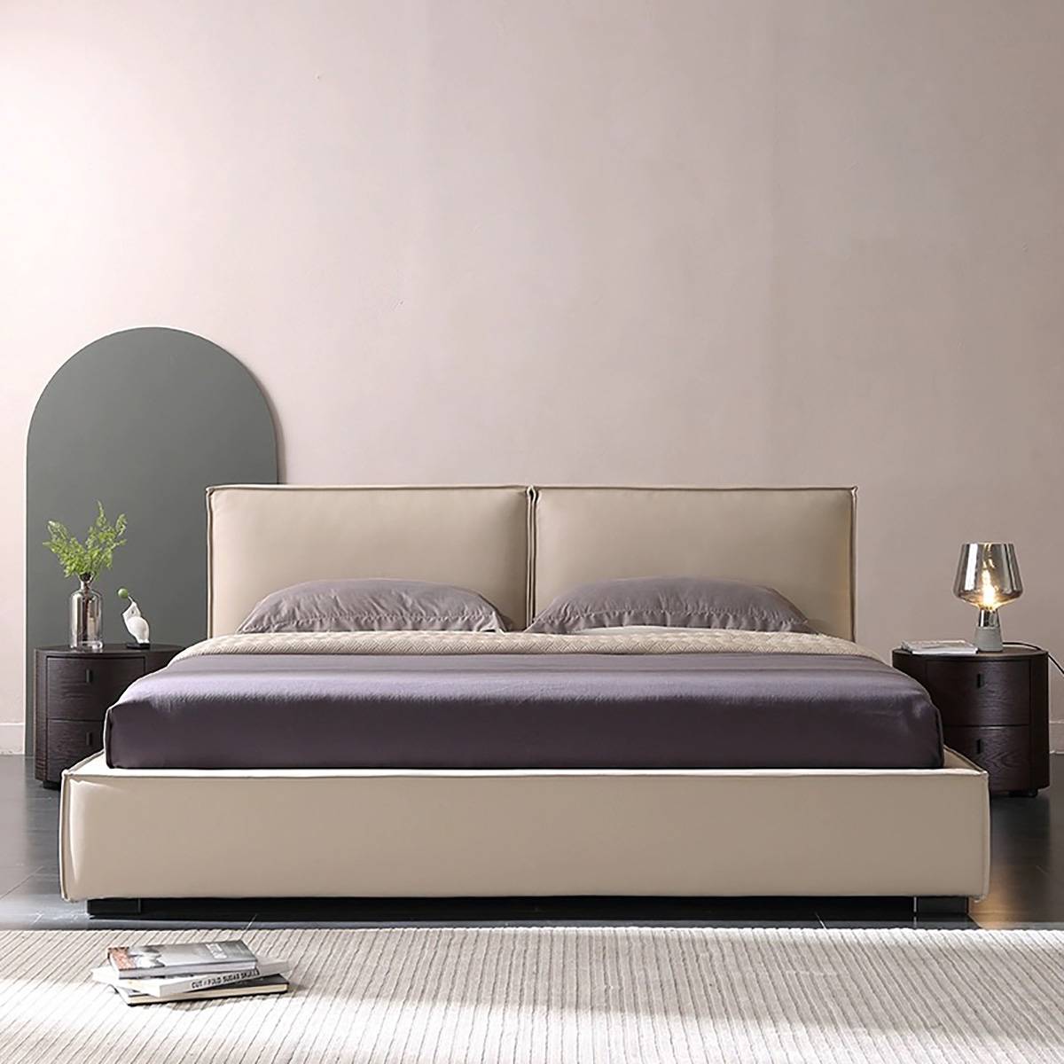 Dark green upholstered bed with split headboard on a white background