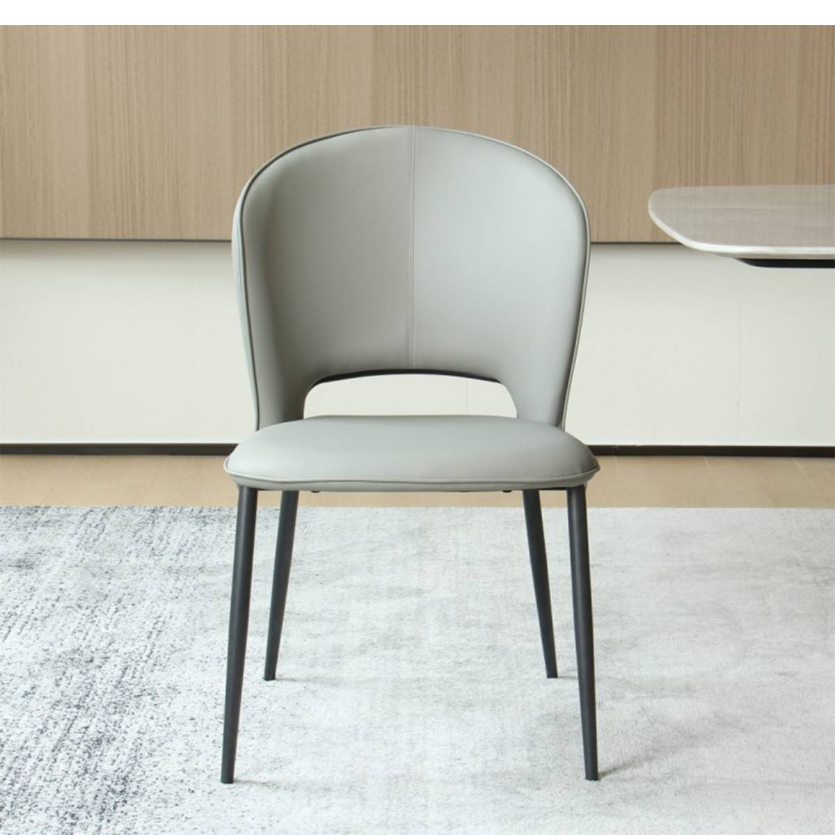 Front view of a beige grey modern dining chair