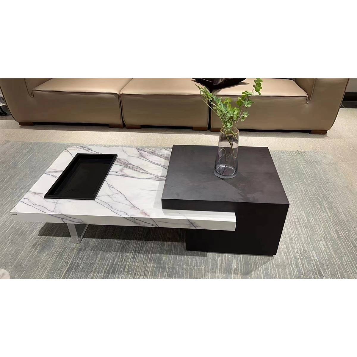 Top-down view of the coffee table with a vase and tray