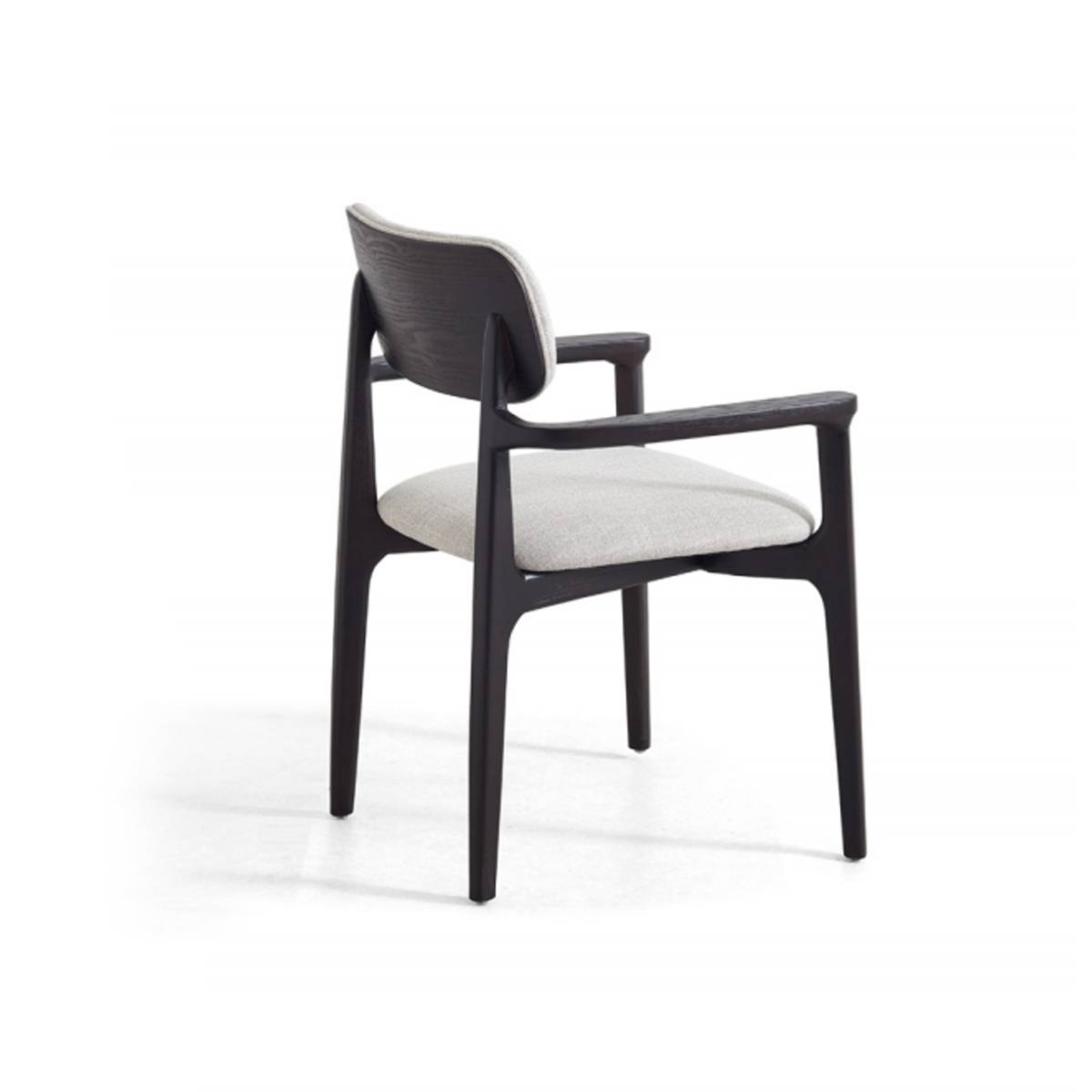 Rear three-quarter view of the armchair showing the solid wood back and frame structure.