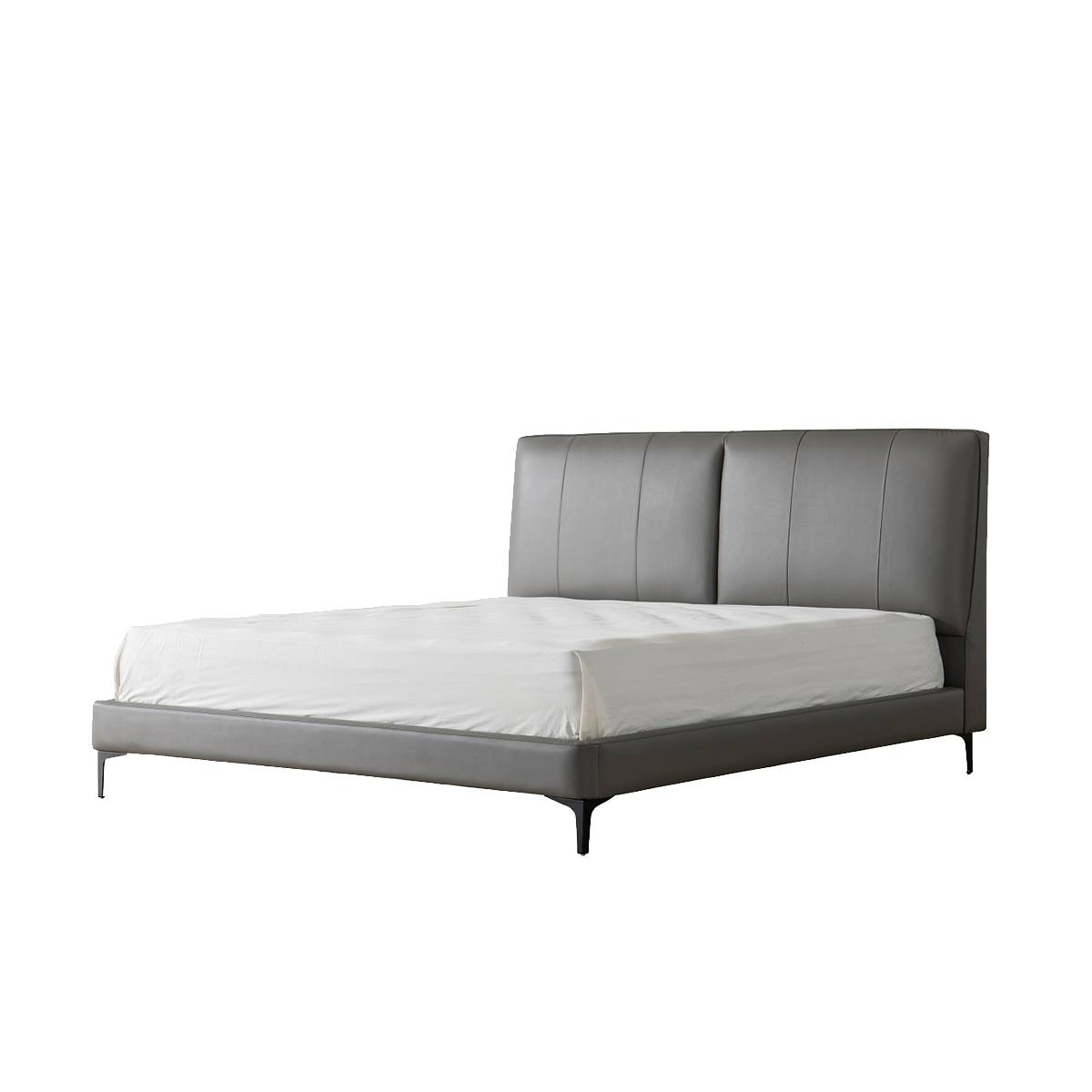 Side angle view of the grey upholstered bed