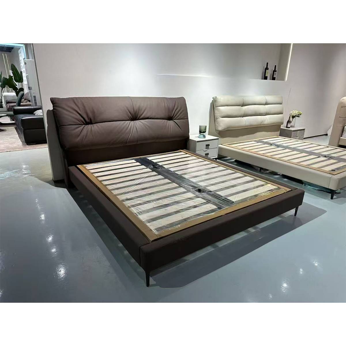 Bed frame without mattress showing the wooden slat support system
