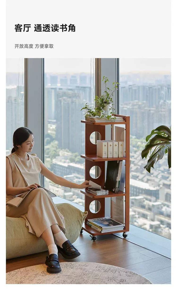 Close-up of the side cabinet showing books and headphones