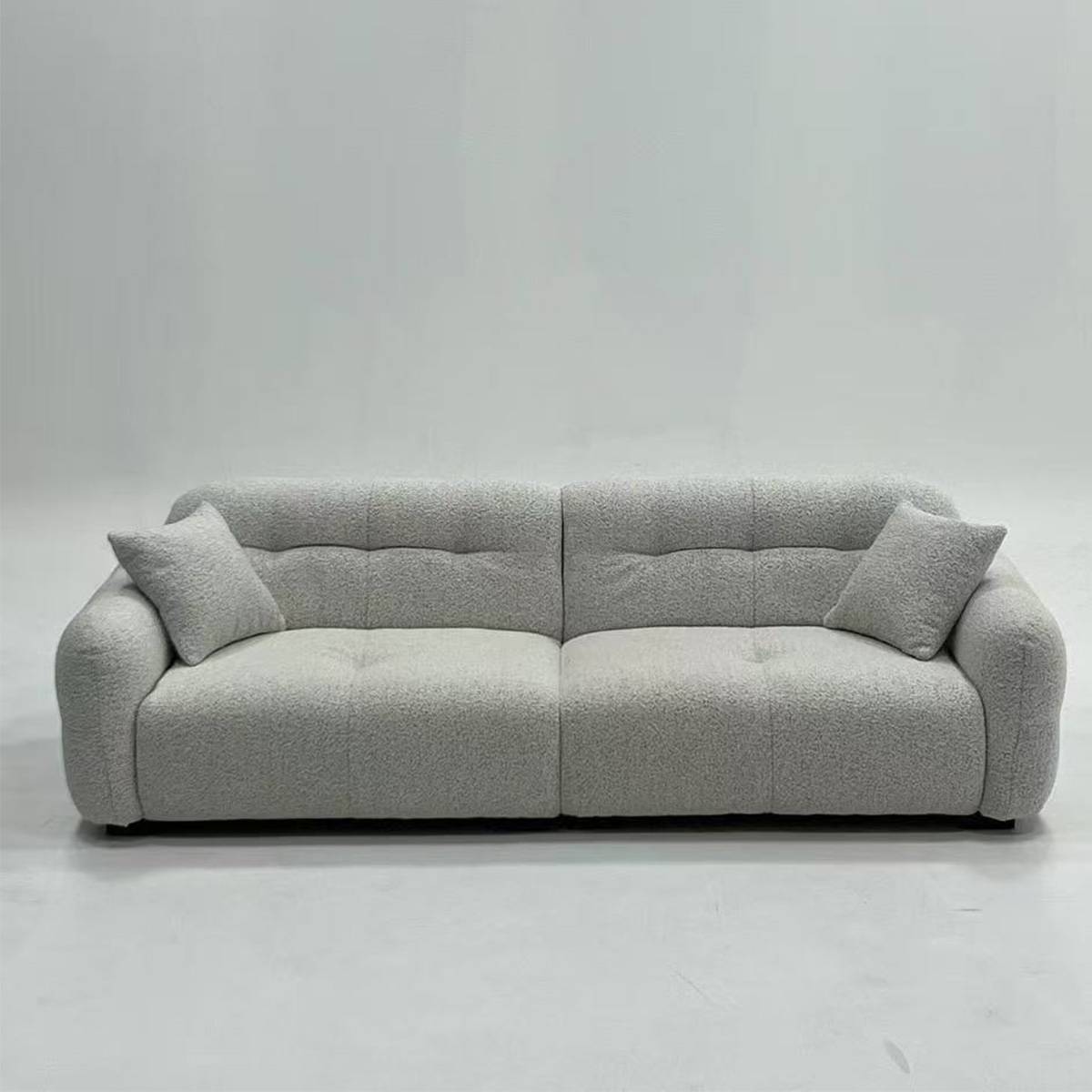 Front view of the sofa showing the full width and seat cushions