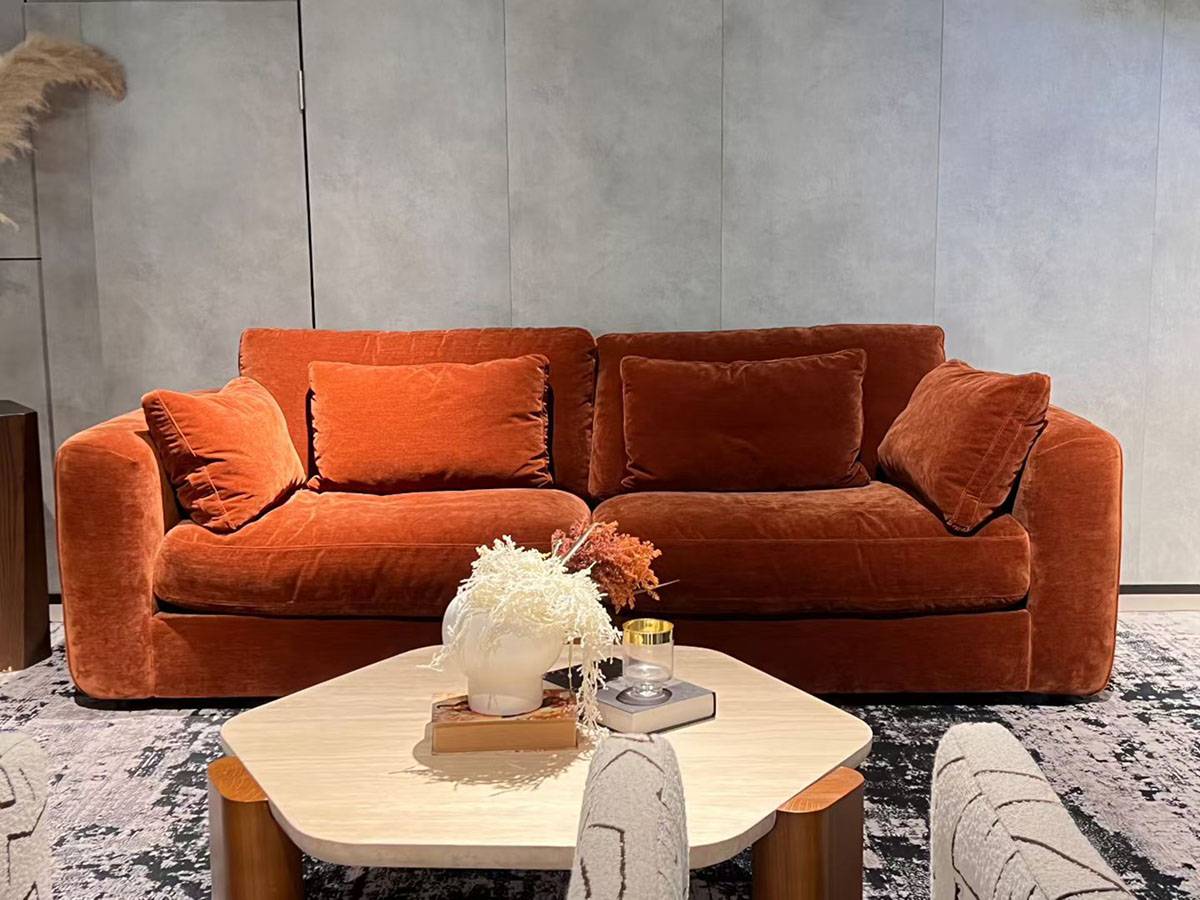 Detail view of the sofa's armrest and fabric material