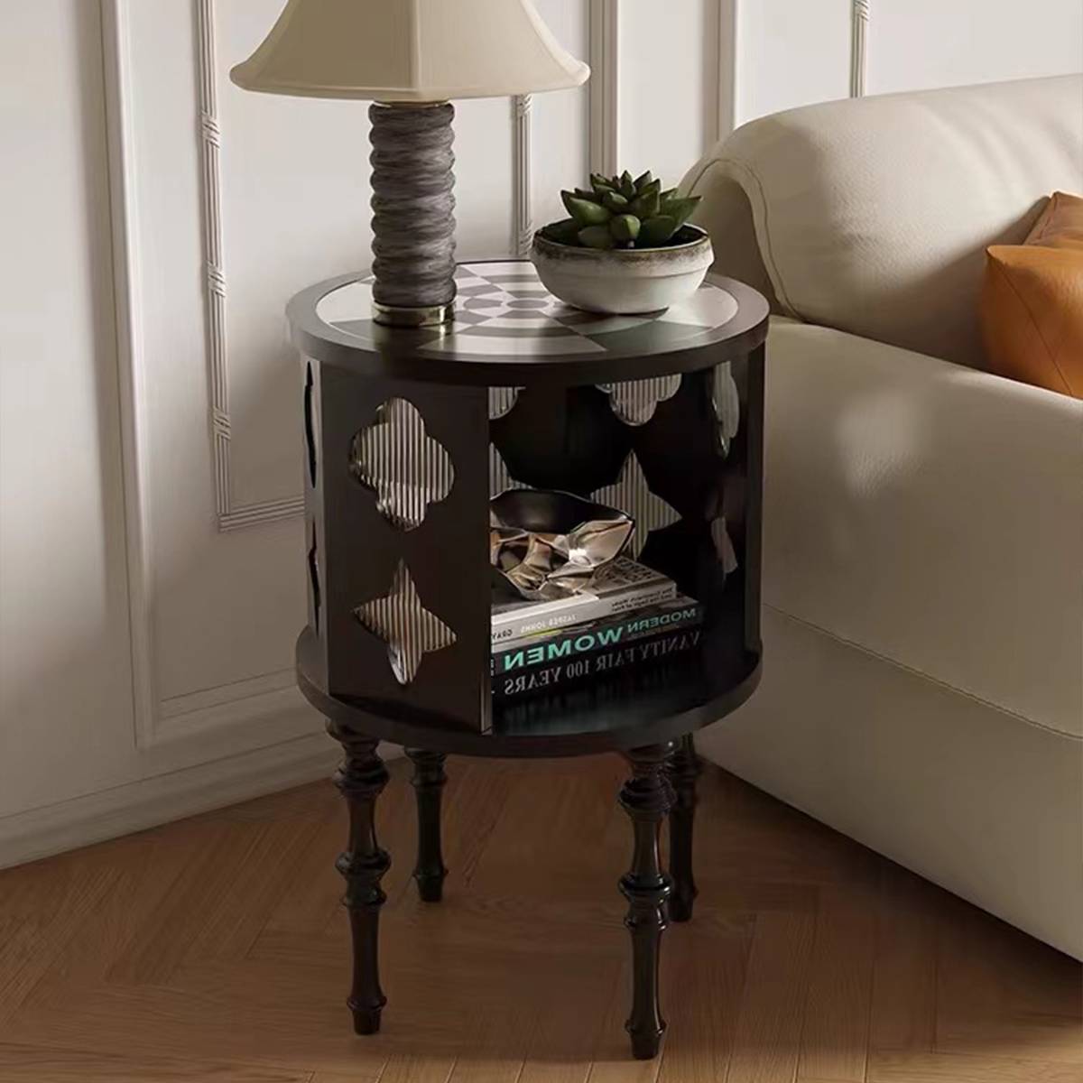 Close up of the side table with a lamp and succulent plant