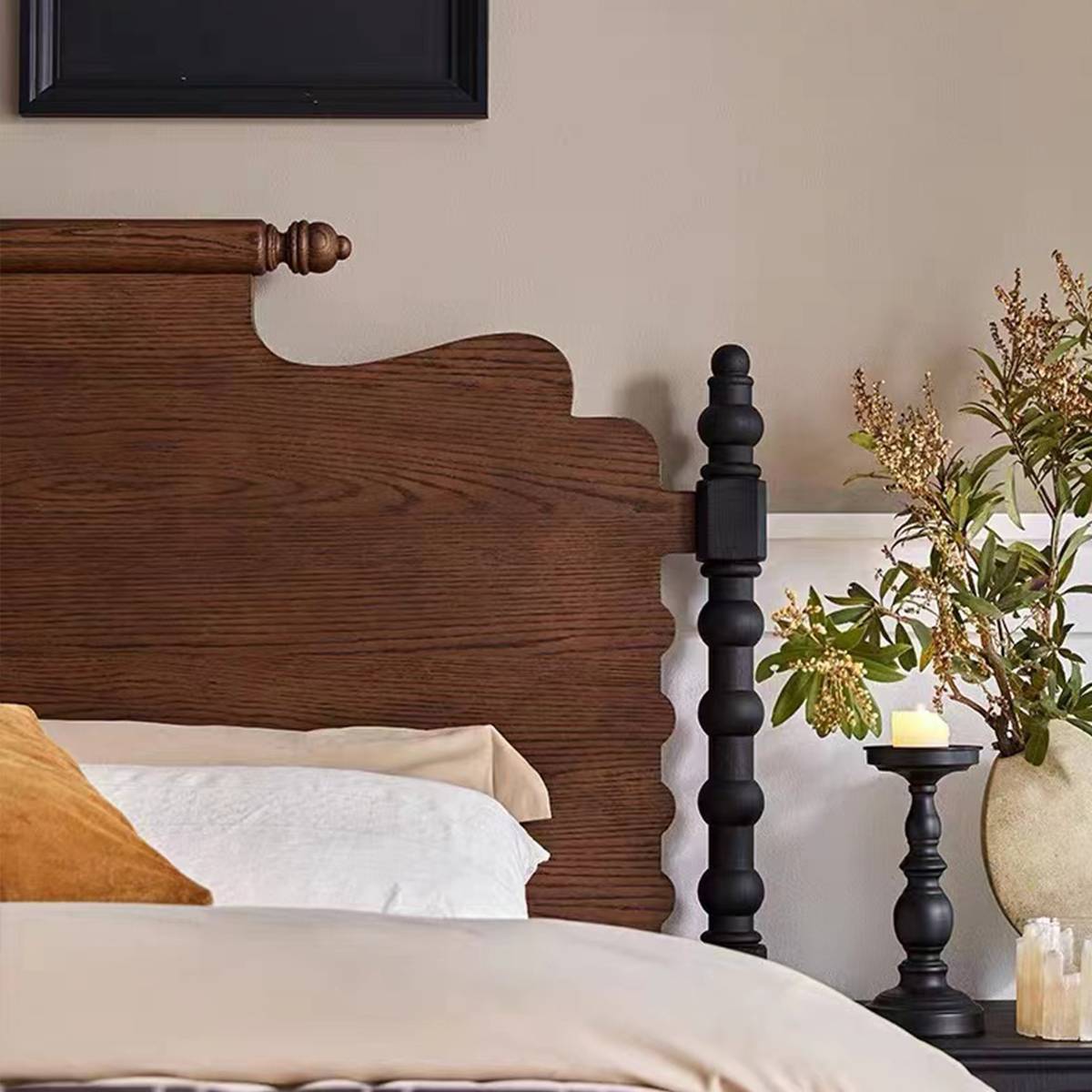 Close-up detail of the bed frame and bedding texture