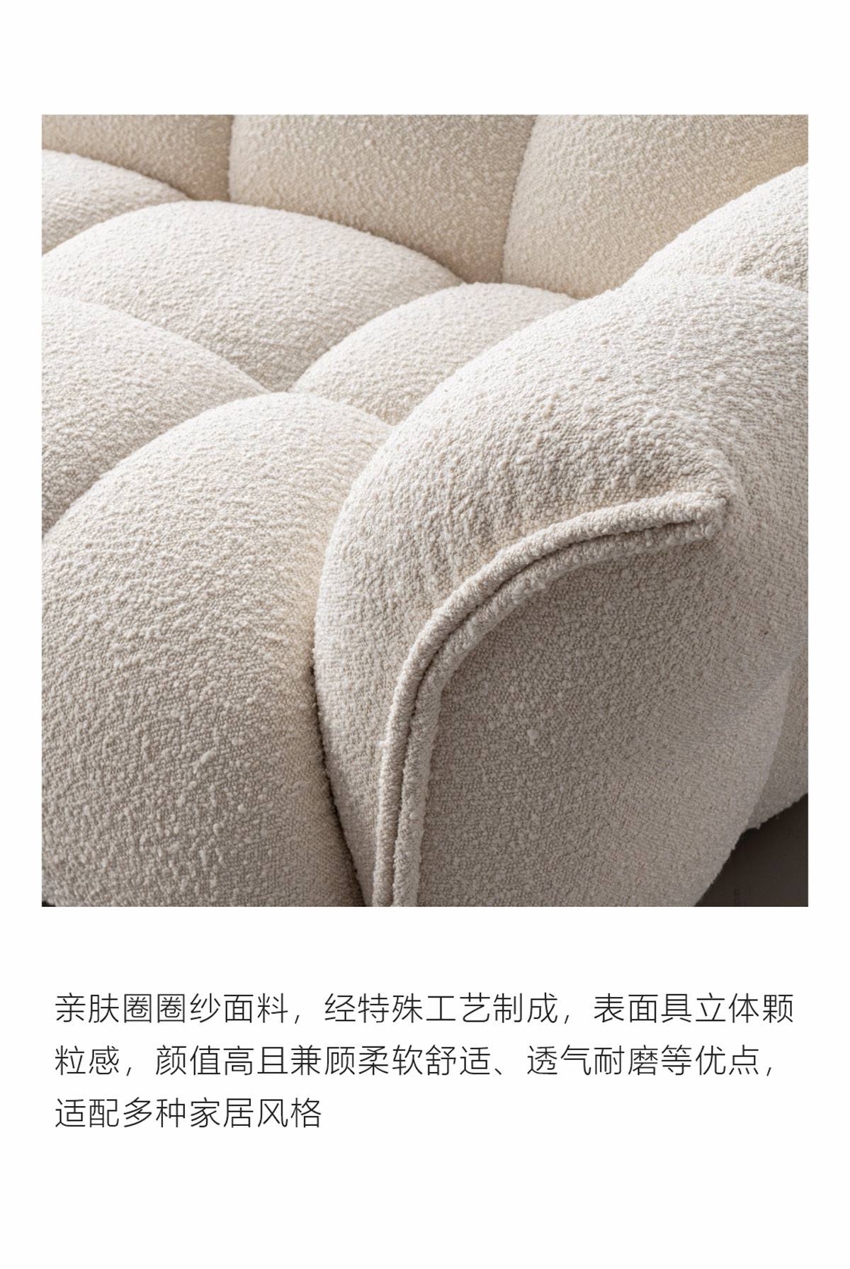 Side view of the sofa showing the petal-like armrest design