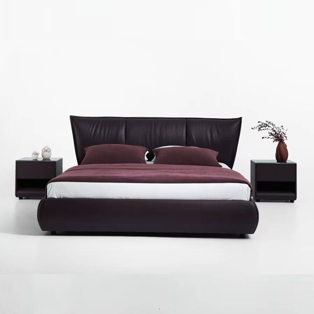 Front view of the dark red leather bed frame