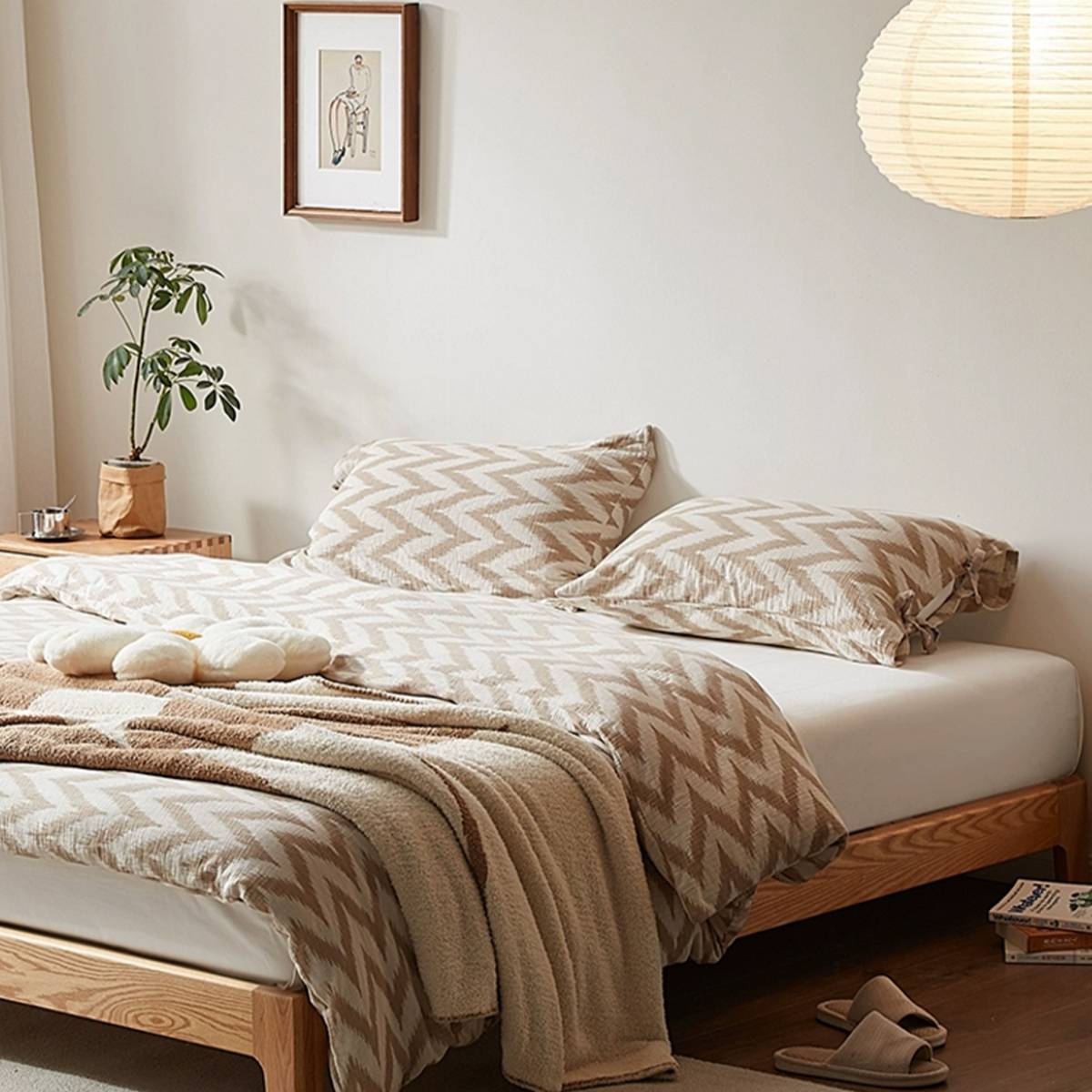 Side angle view of the bed frame showing the wooden texture and bedding arrangement.