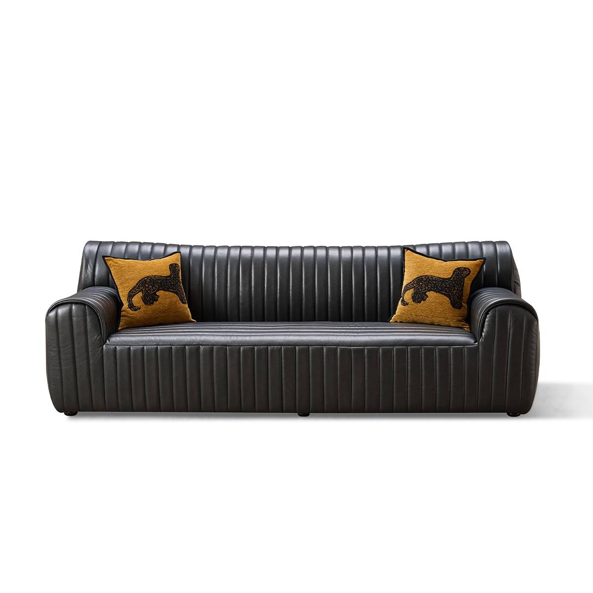 Front view of black leather sofa with vertical ribbed design