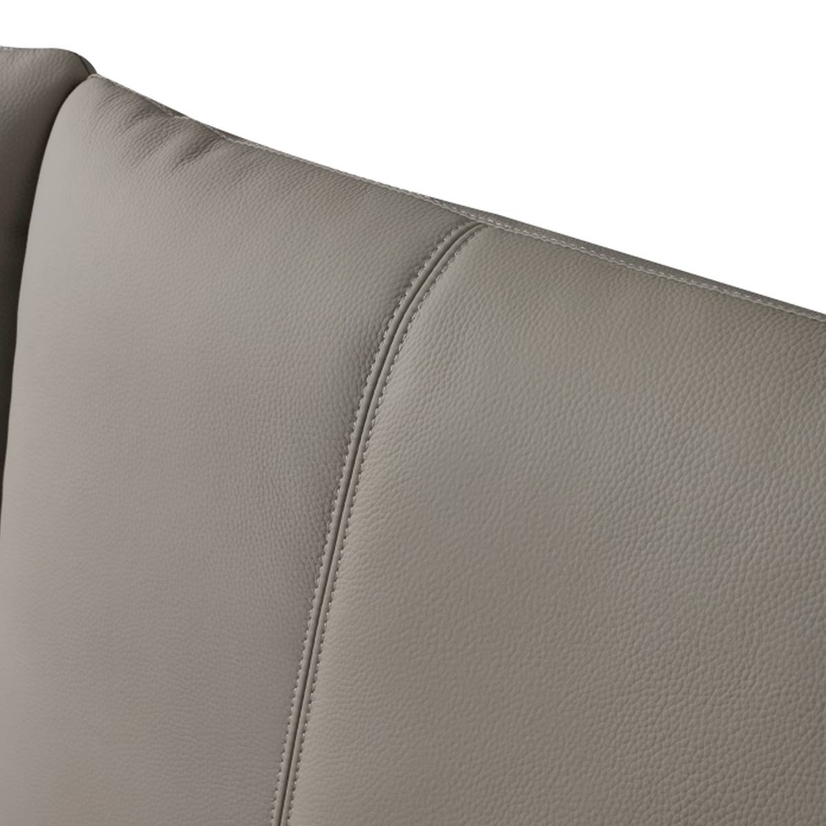 Close-up detail of the leather texture on the headboard